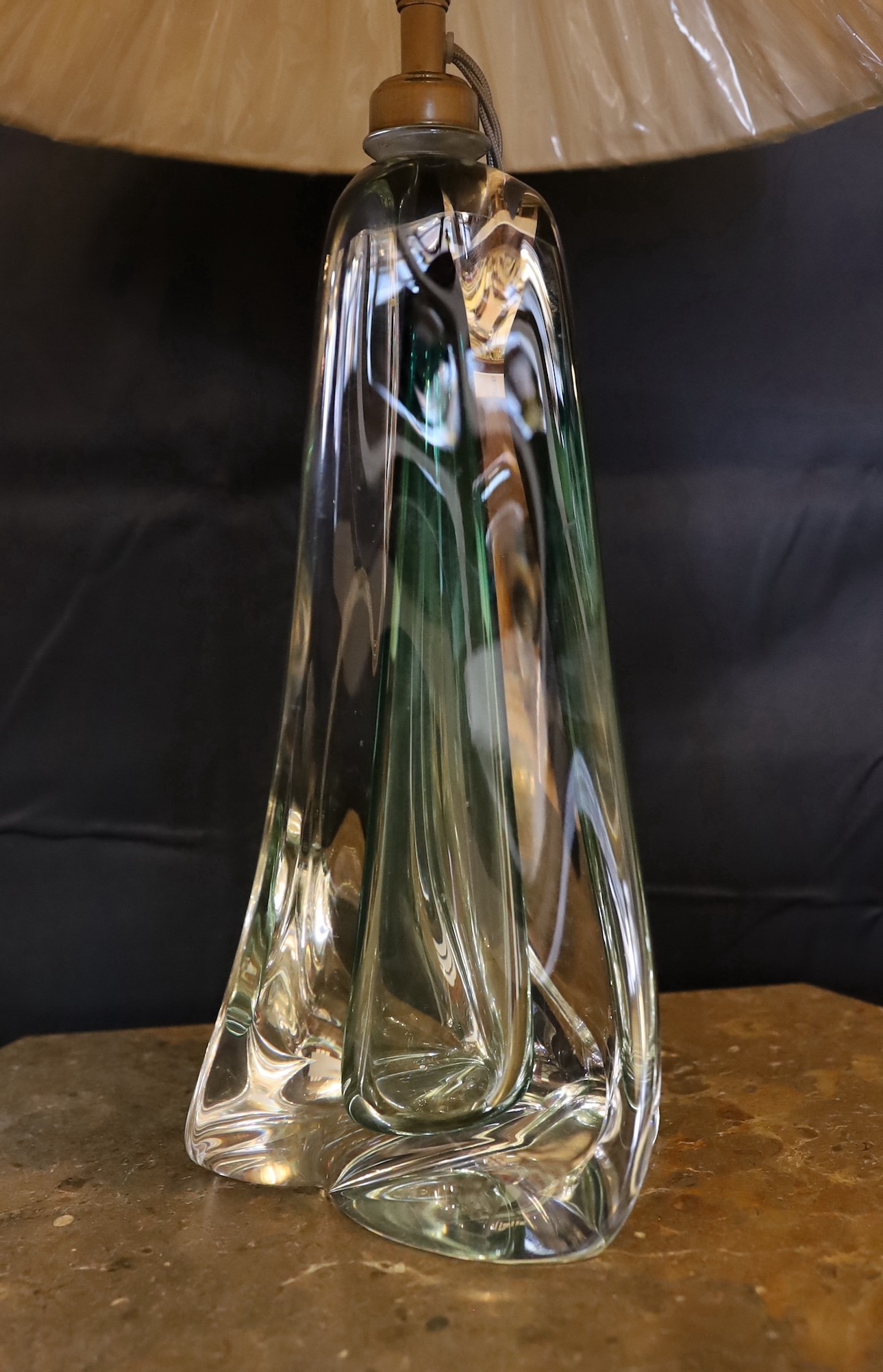 A 1960s Murano glass lamp base, of twisted form, with replacement pleated silk shade, height 38 cm